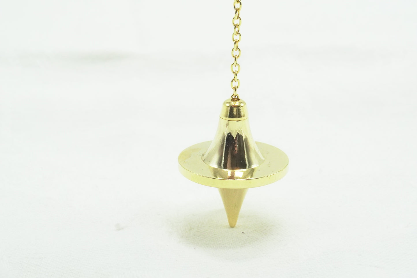 PENDULE LAITON DORÉ TOUPIE