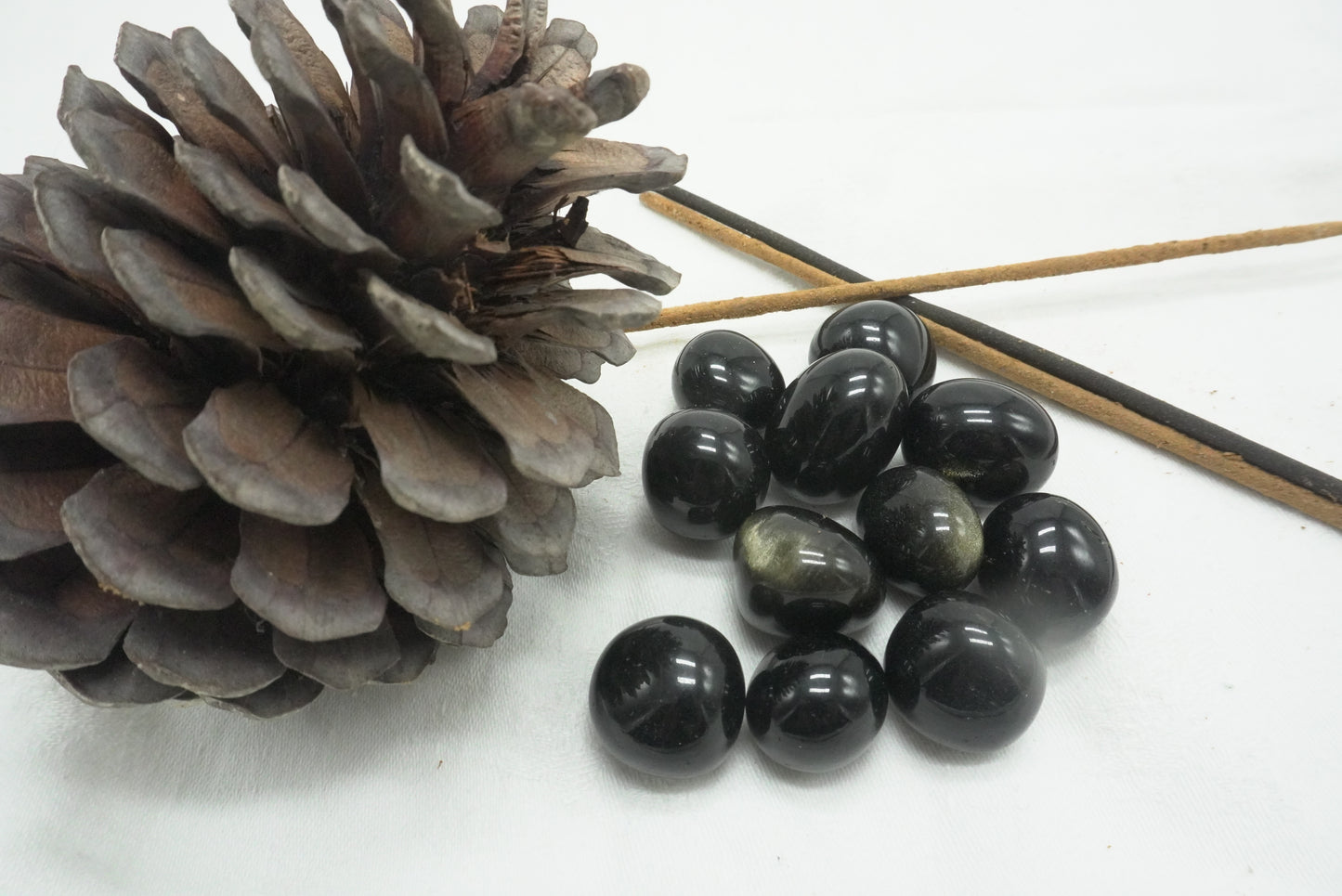 PIERRE ROULEE OBSIDIENNE DOREE