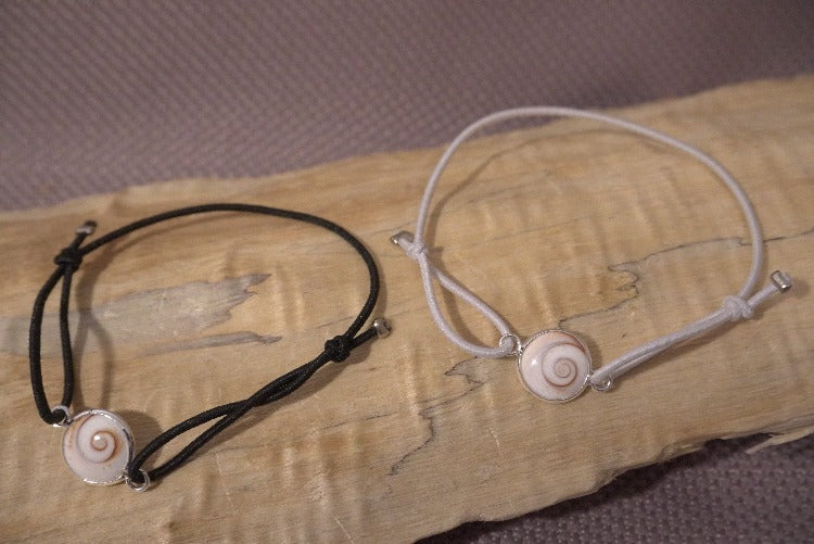 BRACELET FANTAISIE OEIL DE SAINTE LUCIE MEDITERRANEE (cordon blanc ou noir) (ref 130)