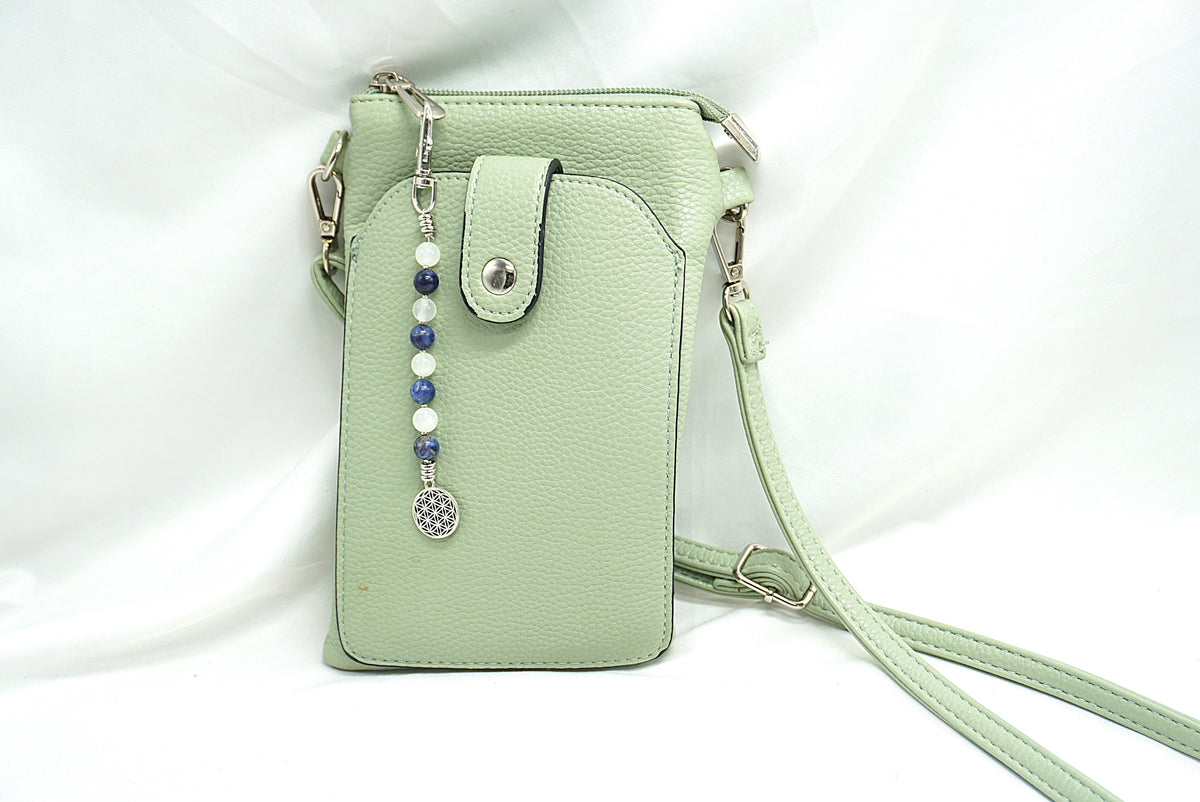 BIJOU DE SAC EN PERLES FLEUR DE VIE
