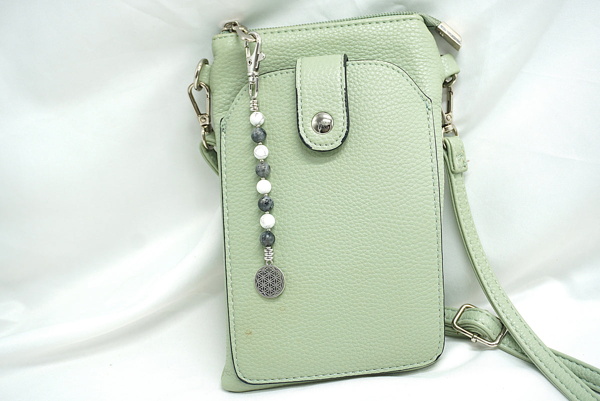 BIJOU DE SAC EN PERLES FLEUR DE VIE