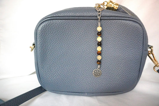 BIJOU DE SAC EN PERLES FLEUR DE VIE