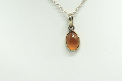 PENDENTIF GRENAT HESSONITE CERCLÉ