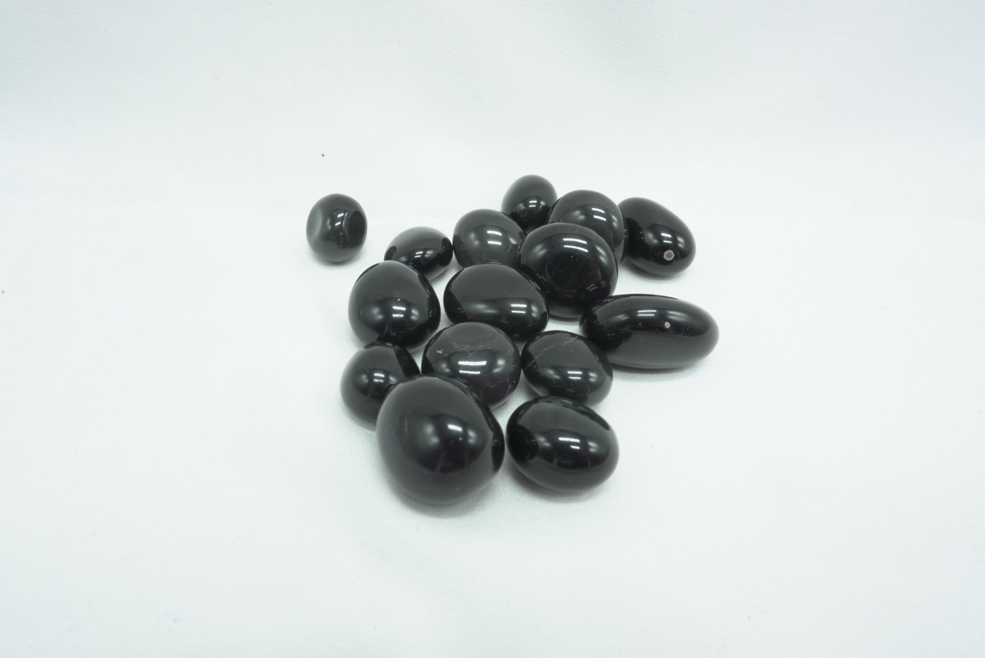 PIERRE ROULEE OBSIDIENNE OEIL CELESTE