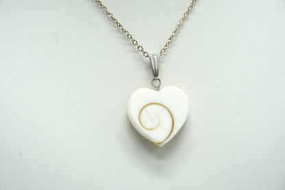 PENDENTIF COEUR OEIL DE SAINTE LUCIE DU PACIFIQUE