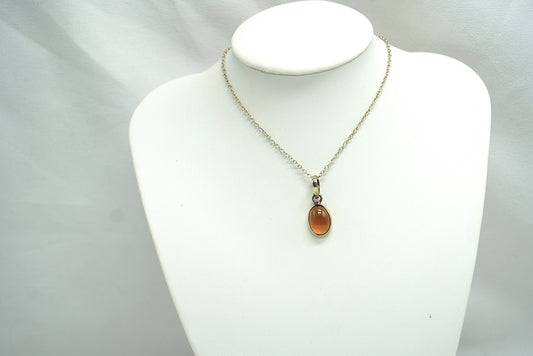PENDENTIF GRENAT HESSONITE CERCLÉ
